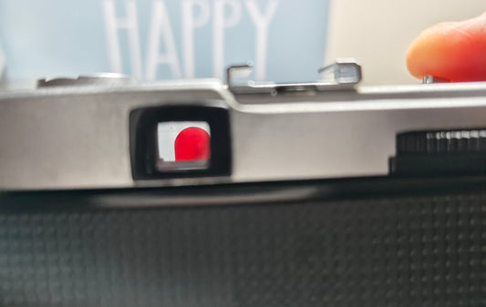 The Red Flag on Your Olympus: What It Does — and What It Doesn't Tell You