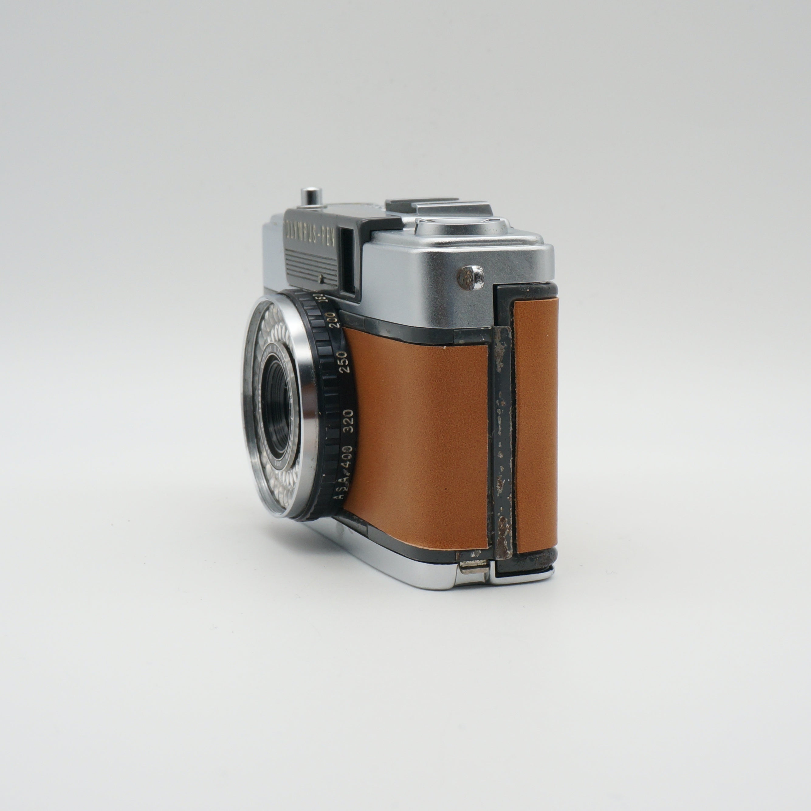 Olympus PEN EE-2 with light brown leatehr – Contrail Camera