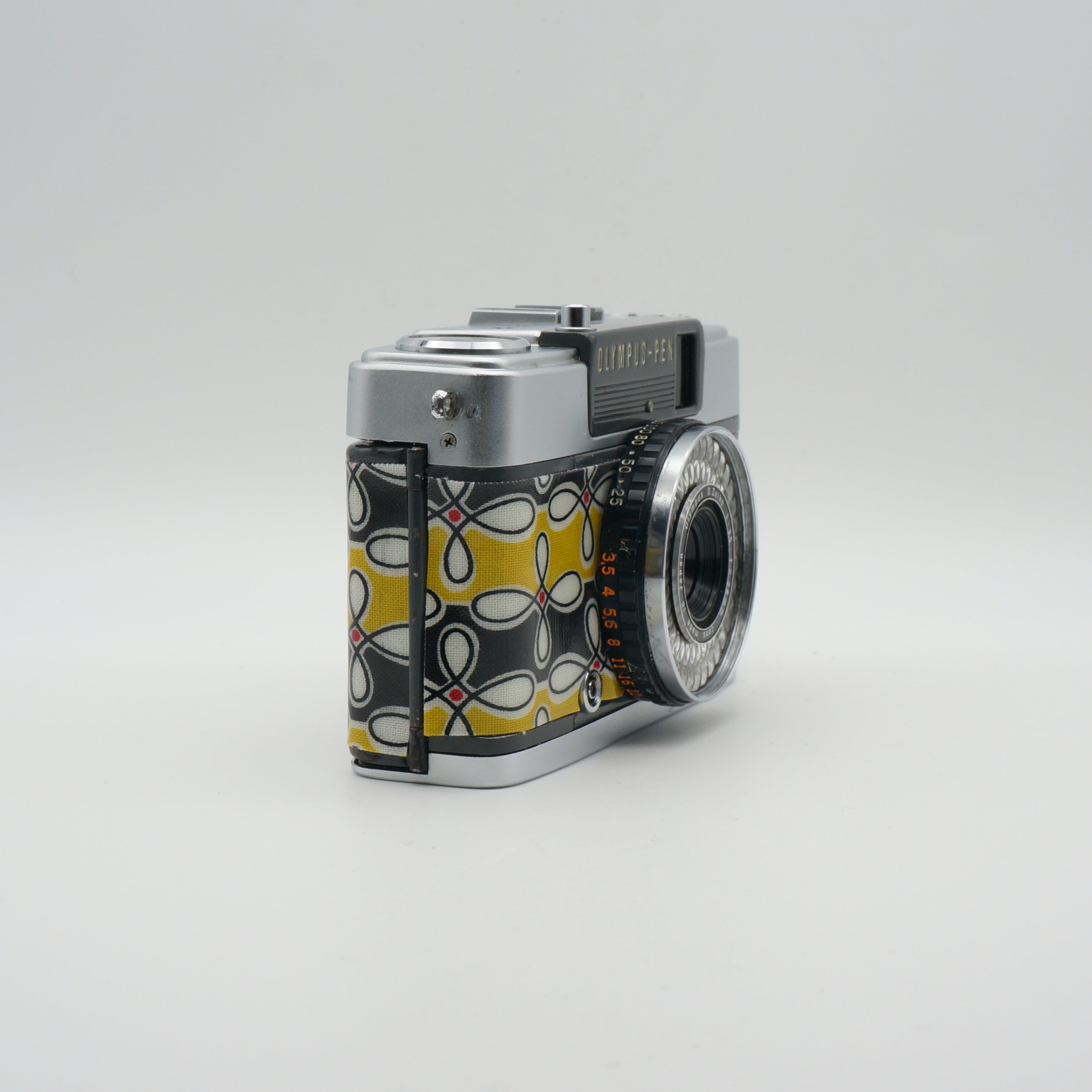 Olympus PEN EE-2 with geometrical pattern PVC – Contrail Camera