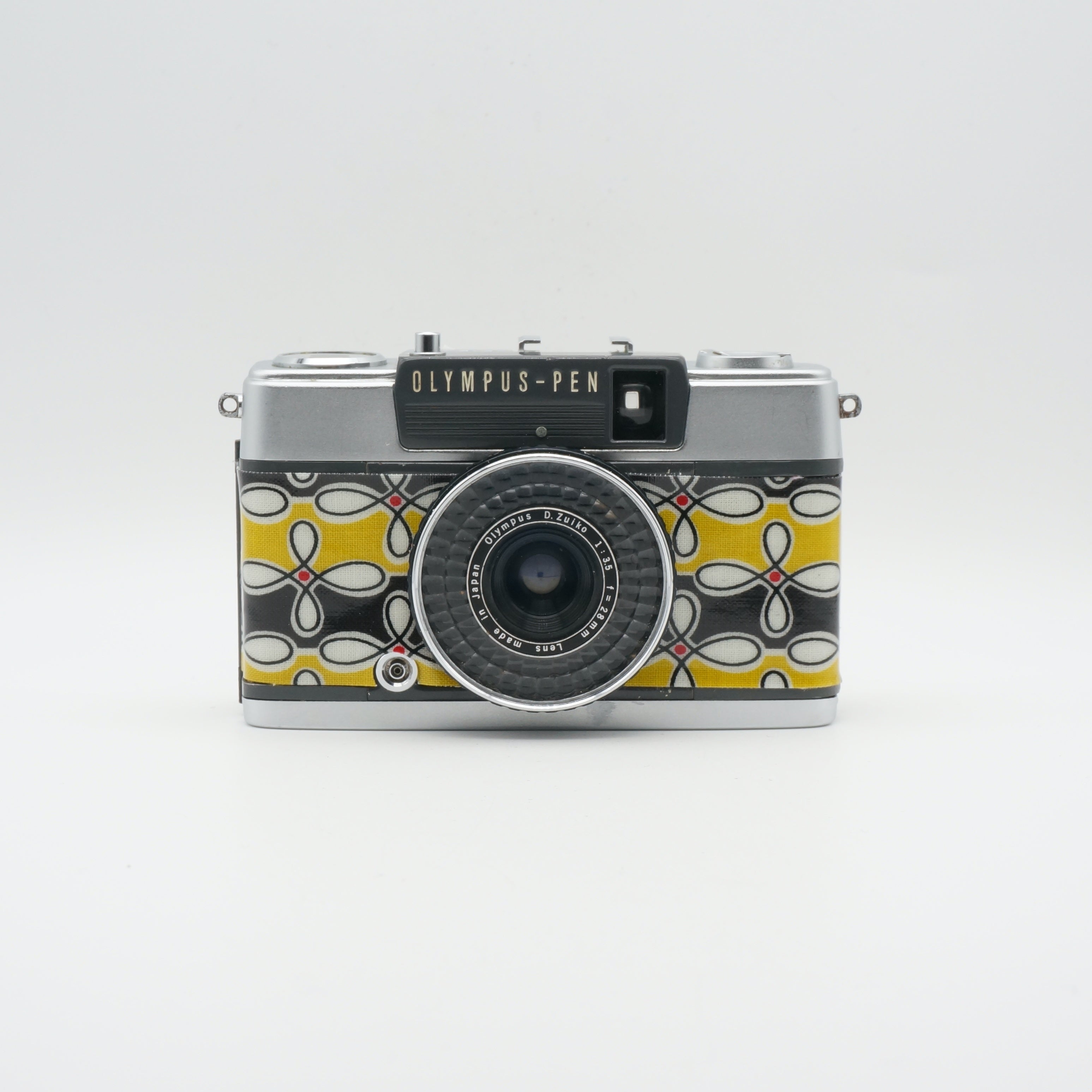 Olympus PEN EE-2 with geometrical pattern PVC – Contrail Camera