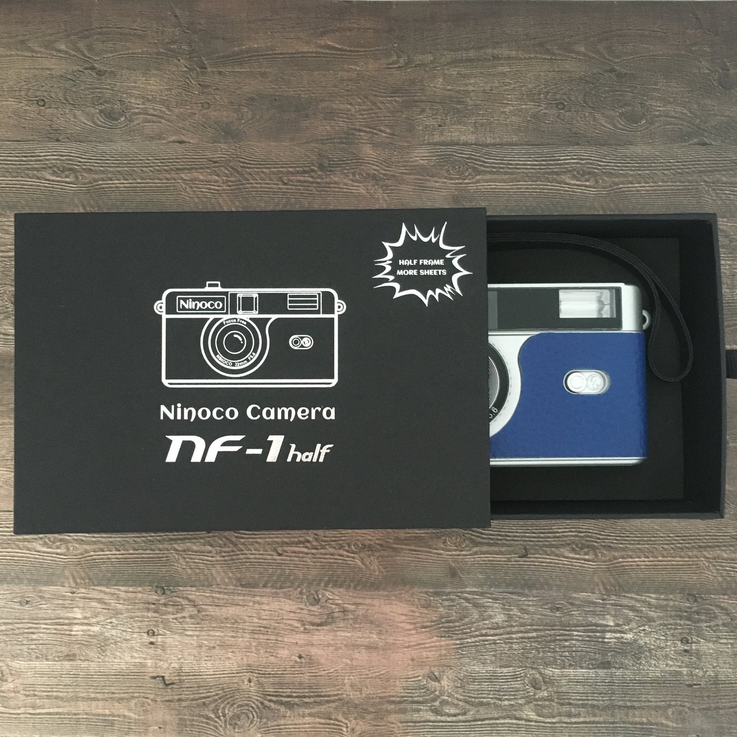 Point & shoot ! Brand new 35mm film camera with marine blue leather