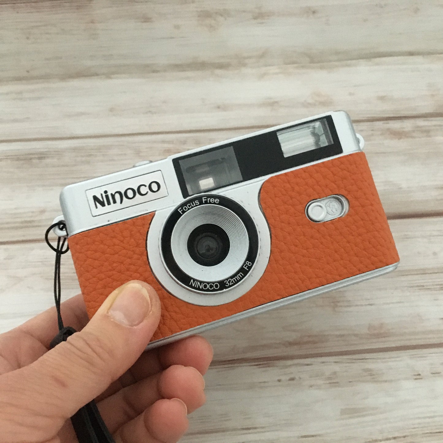 Point & shoot ! Brand new 35mm film camera with apricot orange leather