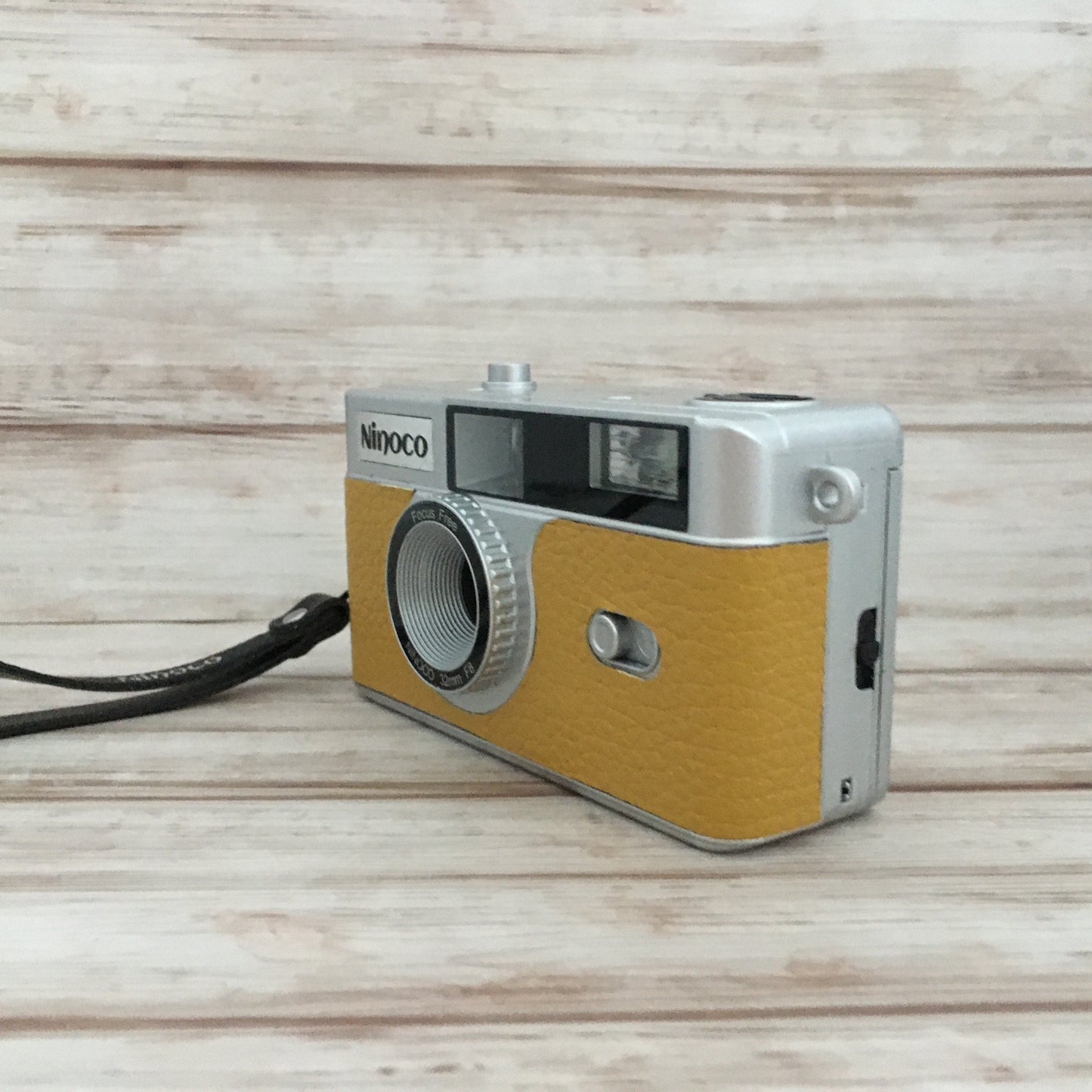 Point & shoot ! Brand new 35mm film camera with mustard yellow leather