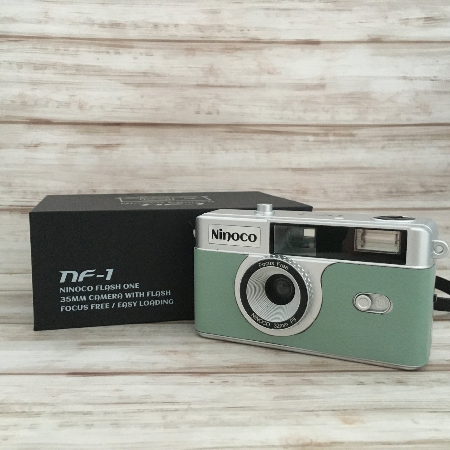 Point & shoot ! Brand new 35mm film camera with opal green leather
