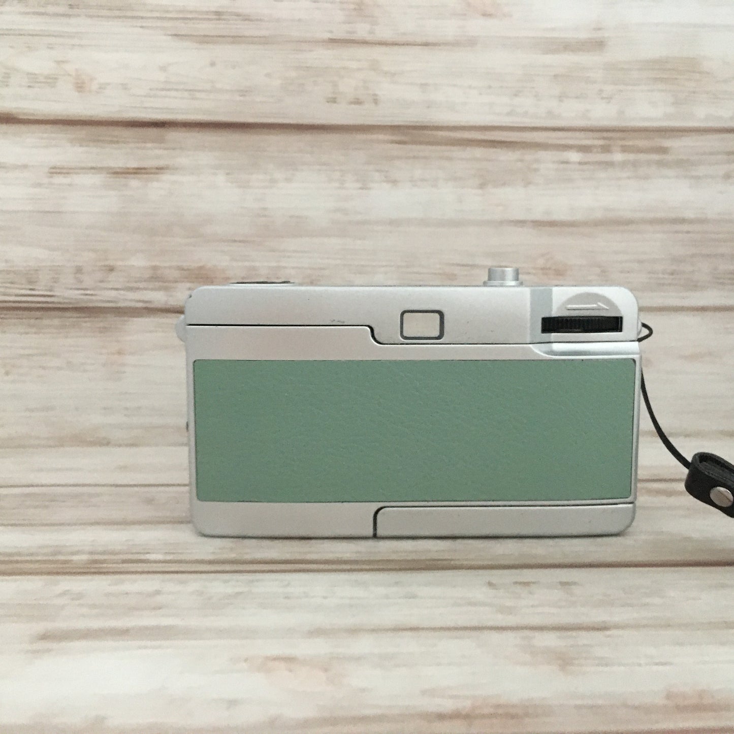 Point & shoot ! Brand new 35mm film camera with opal green leather