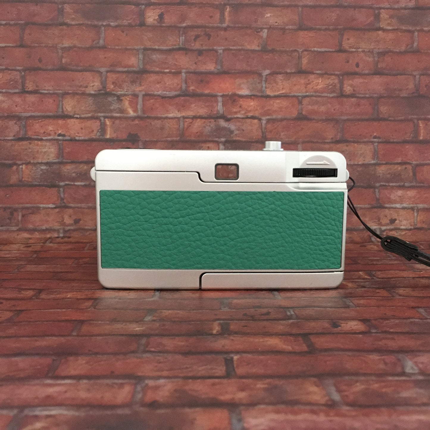 Point & shoot ! Brand new 35mm film camera with jade green leather